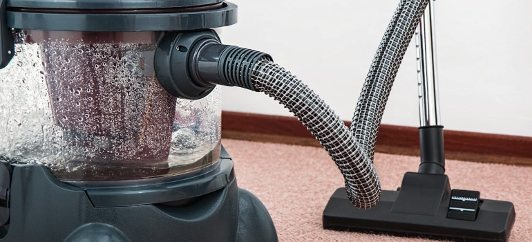 a vacuum cleaner ready fore cleaning before and after moving
